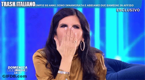 Woman Covering Mouth On TV Saying Trash Italiano GIF