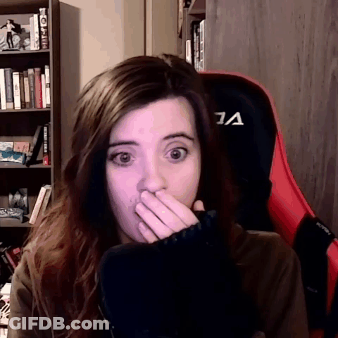 Woman Covering Mouth Sitting In Chair GIF