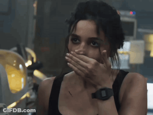 Woman Covering Mouth With Hand Wearing Watch GIF