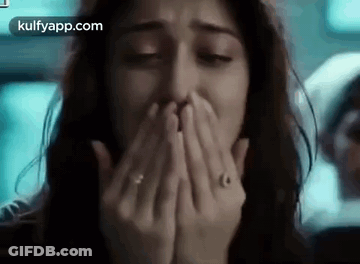 Woman Covering Mouth With Hands And Ring GIF