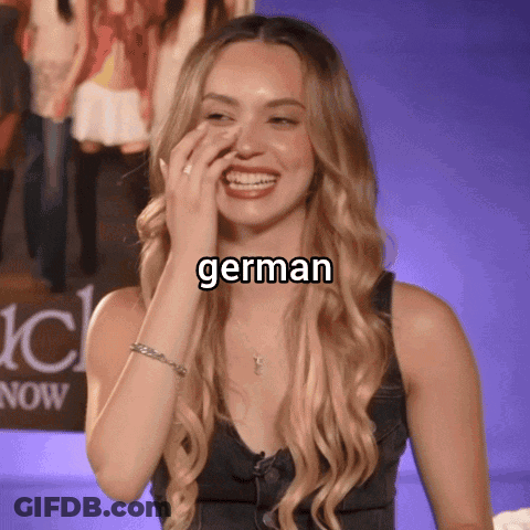 Woman Covering Mouth With Word German Above Head GIF