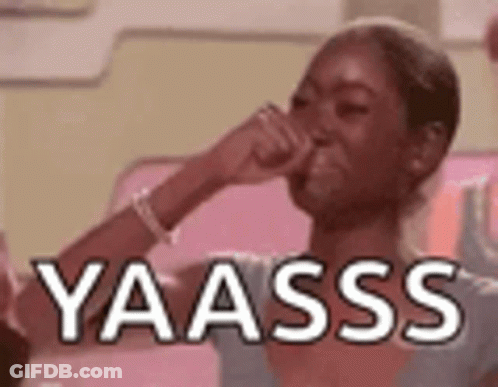 Woman Covering Nose On Pink Couch Saying Yassss GIF