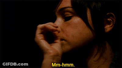 Woman Covering Nose With Hand GIF