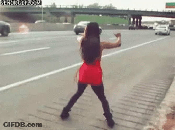 Woman Crazy Dancing On The Roadside GIF