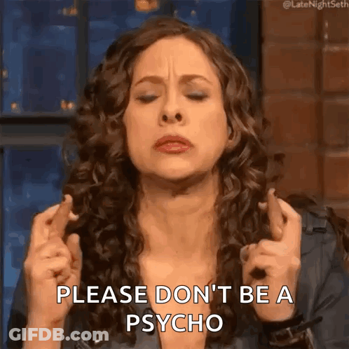 Woman Crossing Fingers Making Face GIF