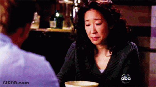 Woman Crying At Table With ABC Logo GIF