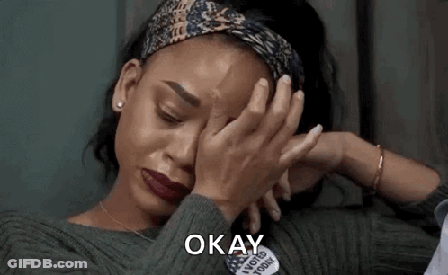 Woman Crying Covering Face Saying Okay GIF
