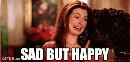 Woman Crying Holding Fan Sad But Happy GIF
