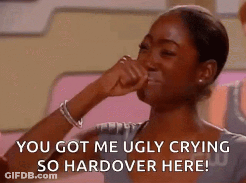 Woman Crying Holding Hand To Face GIF