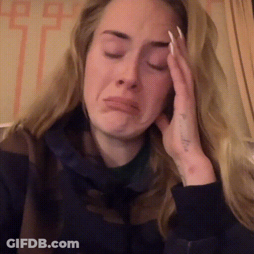 Woman Crying Holding Head GIF