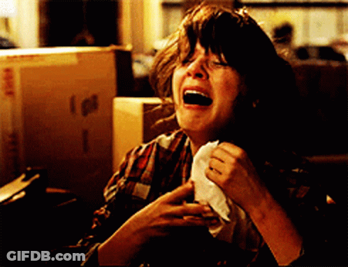 Woman Crying Holding Napkin GIF