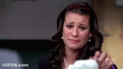 Woman Crying Holding Paper GIF