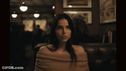 Woman Crying In Dark Room Man At Table GIF
