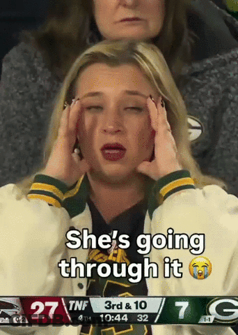 Woman Crying In Front Of Green Bay Packers Game GIF