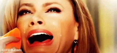 Woman Crying On Cell Phone GIF