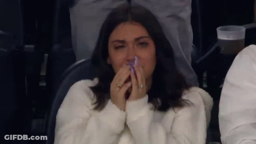 Woman Crying Sitting In Stadium GIF