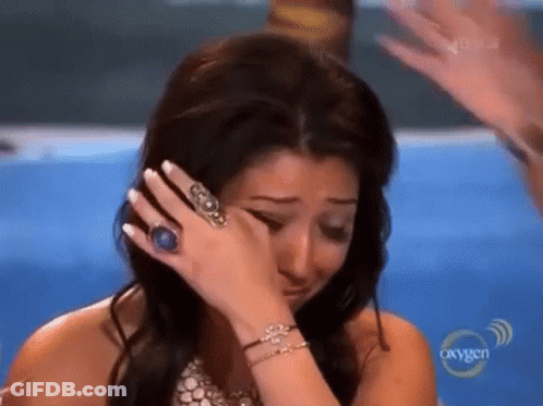Woman Crying Wearing Ring And Bracelets GIF