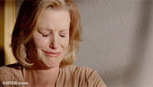 Woman Crying With Eyes Closed GIF