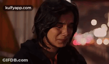 Woman Crying With Eyes Closed GIF