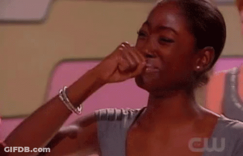 Woman Crying With Fist To Mouth GIF