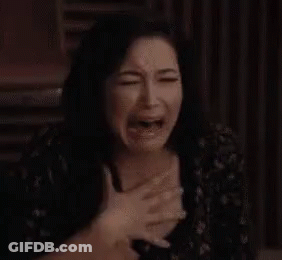 Woman Crying With Hands On Chest Making Funny Face GIF