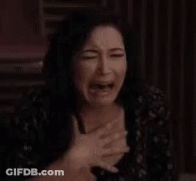 Woman Crying With Hands On Chest Making Funny Face GIF
