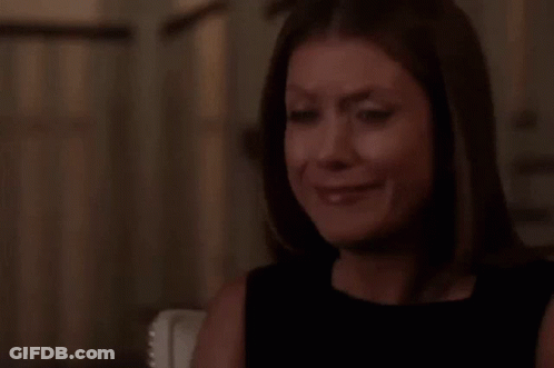 Woman Crying With Tear At Table GIF