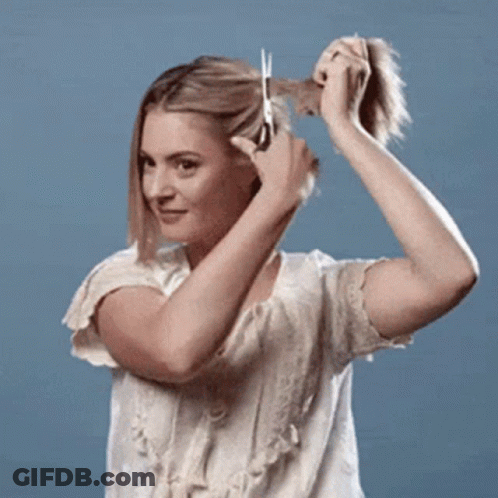Woman Cutting Hair With Scissors GIF