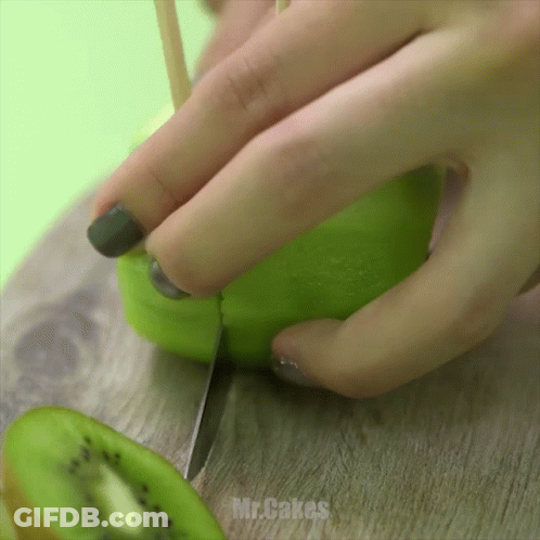 Woman Cutting Kiwi With Knife Mr. Cakes GIF