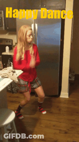 Woman Dancing Happy Dance In Front Of Refrigerator GIF
