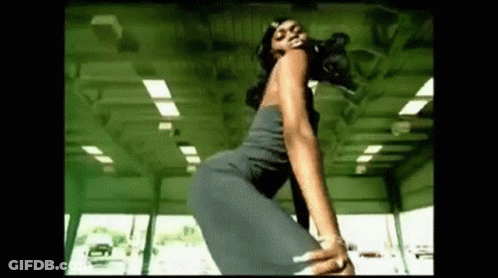 Woman Dancing In Black Dress In Gym GIF