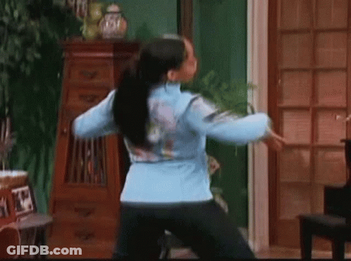 Woman Dancing In Blue Jacket GIF