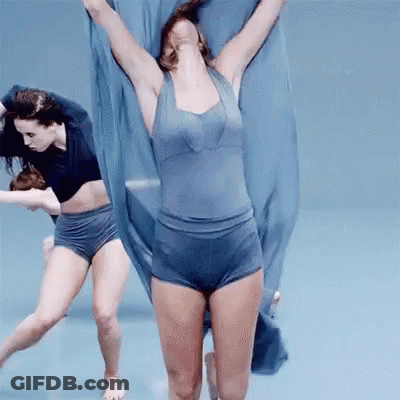 Woman Dancing In Blue Leotard And Shorts GIF