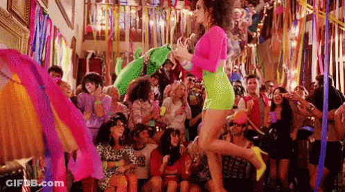 Woman Dancing In Crowd At Party GIF