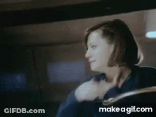 Woman Dancing In Dark Room GIF
