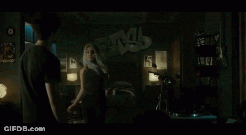 Woman Dancing In Dark Room GIF