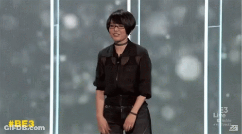 Woman Dancing In Front Of Be3 Screen GIF