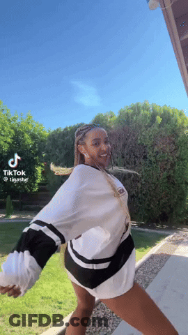 Woman Dancing In Front Of Blue Sky Tik Tok GIF