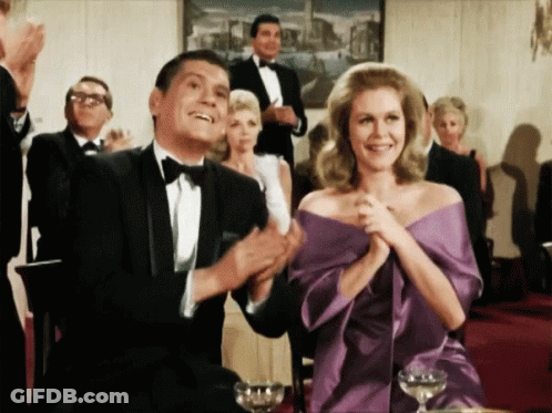 Woman Dancing In Front Of Brick Wall And Gold Throne GIF