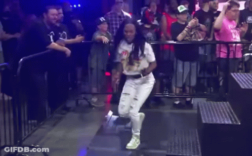 Woman Dancing In Front Of Crowd GIF