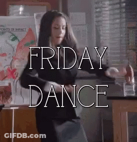 Woman Dancing In Front Of Friday Dance Sign GIF