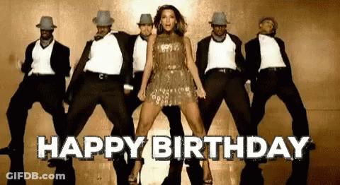 Woman Dancing In Front Of Men Says Happy Birthday GIF