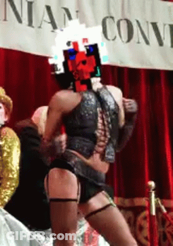 Woman Dancing In Front Of Nia Convention Sign GIF