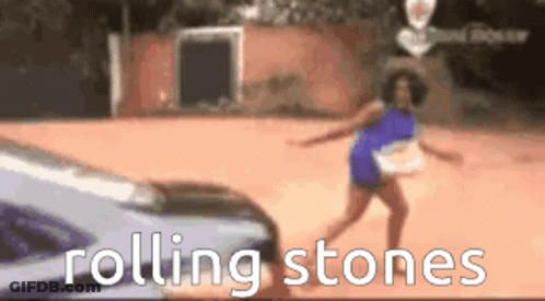 Woman Dancing In Front Of Rolling Stones Car GIF