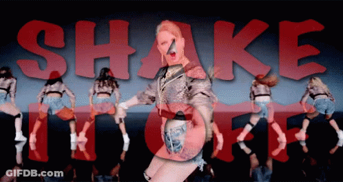 Woman Dancing In Front Of Shake It Off Sign GIF