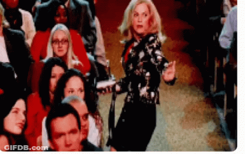 Woman Dancing In Front Of Theater Crowd GIF