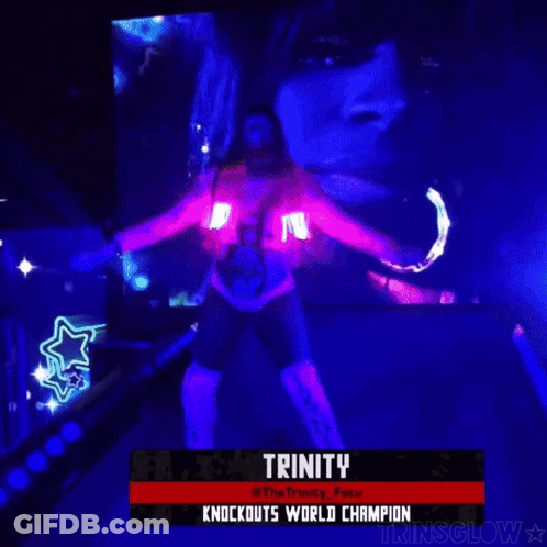 Woman Dancing In Front Of Trinity Screen GIF