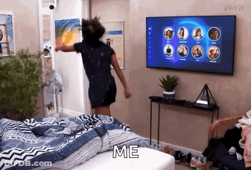 Woman Dancing In Front Of TV Saying Me GIF