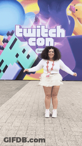 Woman Dancing In Front Of Twitch Con Sign GIF