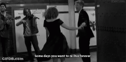 Woman Dancing In Front Of Violin And Guitar Players GIF